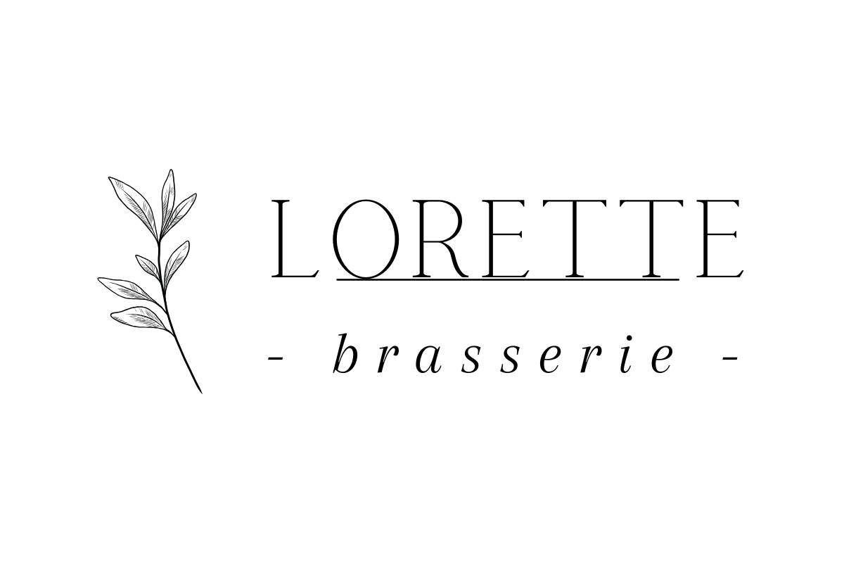 Skier riding down mountain on a sunny day blue skies and fresh powder kicking up behind